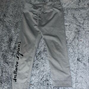 Under armour girls 24 months leggings with script logo graphic on leg.